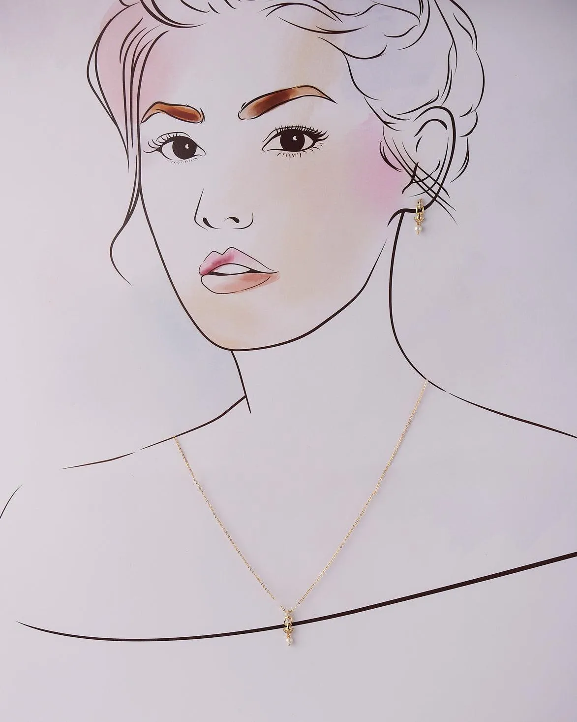 A cute pendant matched with golden polish chain with matching earrings.